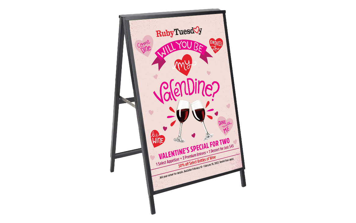 Mockup of an A-Frame Poster designed for Ruby Tuesday's Valentines Day 2022 promotion with unique hand-lettered title and photo illustration.